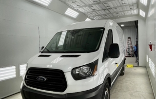 Van in fleet repair paint booth