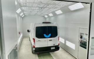 Van in fleet repair paint booth